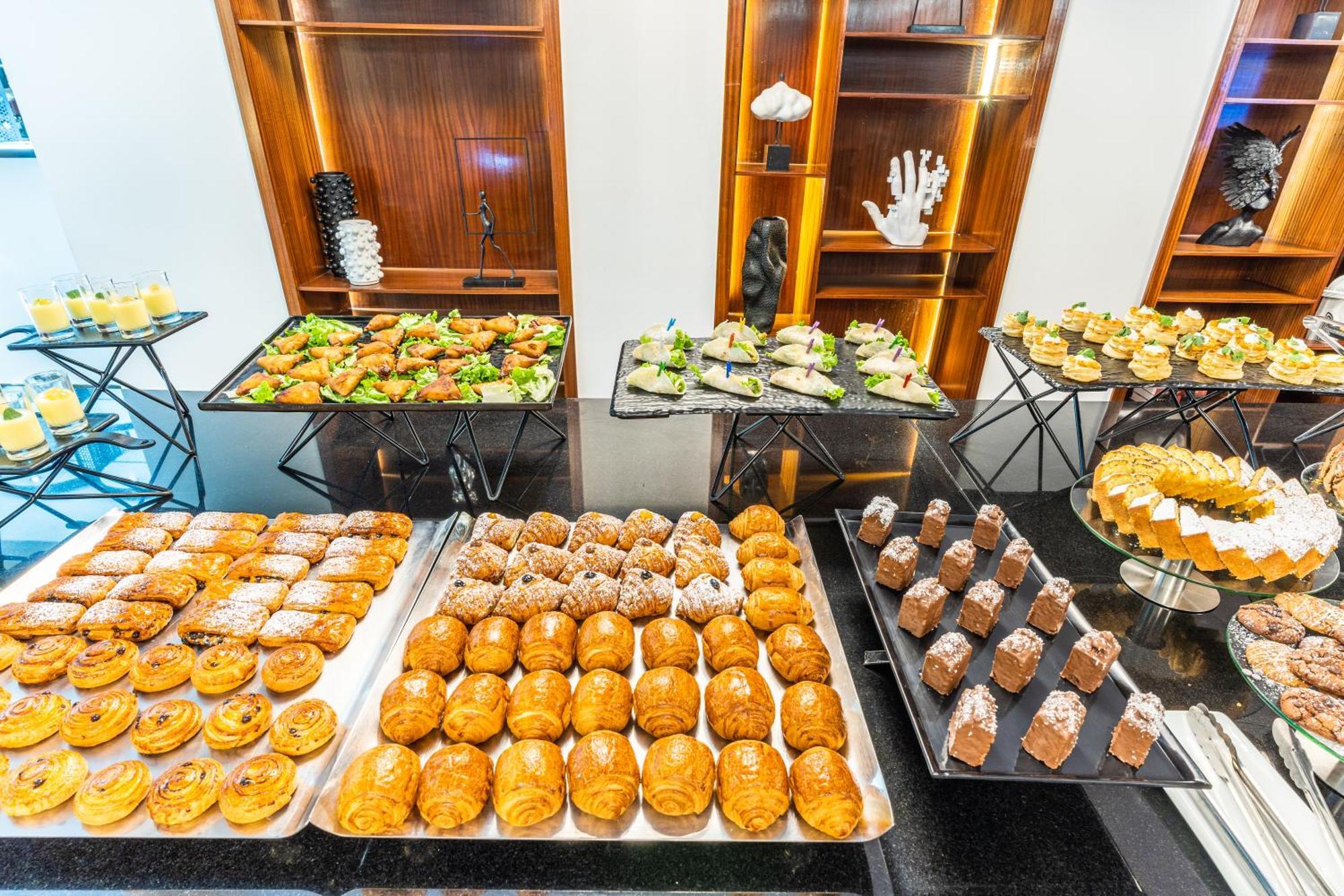 One Hotel Casablanca Exterior photo A selection of pastries at a buffet